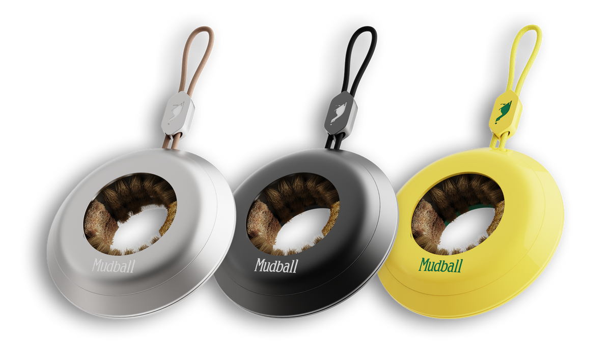 The Mudball in all three colors — silver, black and yellow — each with a matching hang rope